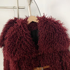 Close-up of dramatic wide oversized lapel on fluffy vegan curly fur coat
