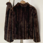Rear view of warm brown vegan mink style cropped winter coat