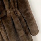 Detail shot of silky dense faux mink fur sleeve texture