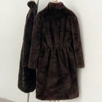 Back view of cinched drawstring waist on luxury vegan faux mink long coat