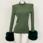 Unique turquoise green mock neck sweater with premium genuine fur detail