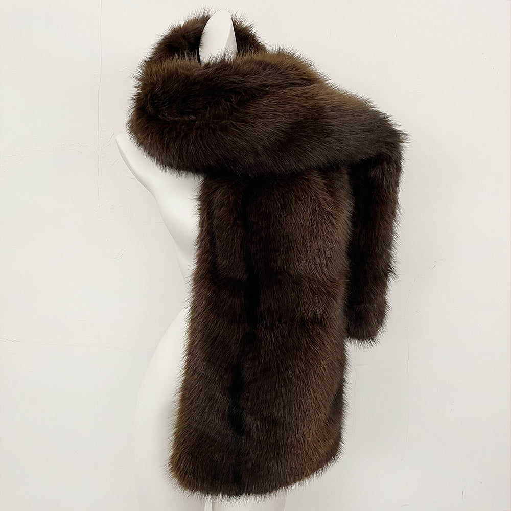 Side view of a rich coffee brown long-line faux fur gilet with voluminous shawl collar