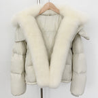 All-white luxury winter look: cream down jacket with pure white fox fur