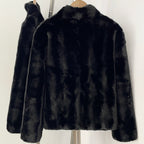 Back view of minimalist black vegan faux mink cropped coat