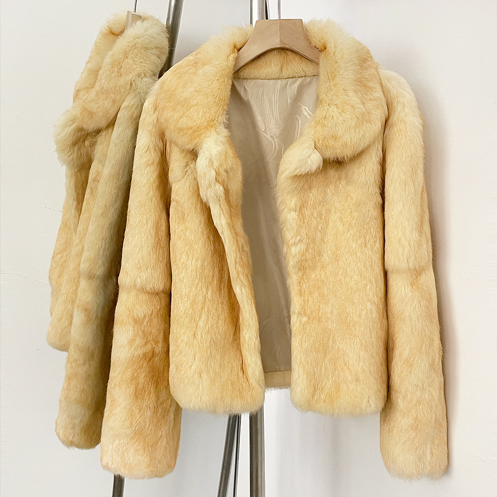 Open front shot showing smooth printed satin lining of cream rabbit fur jacket