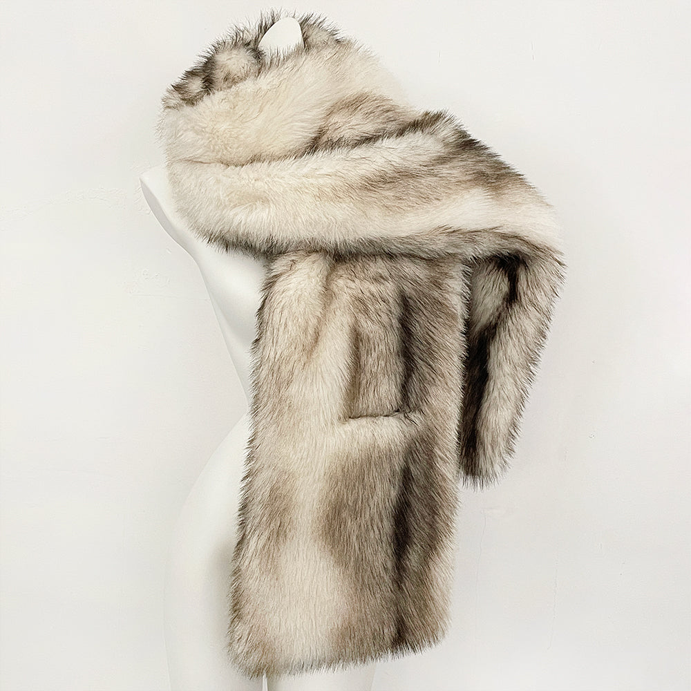 Front view of an elegant cream white vegan fur sleeveless overcoat on a mannequin