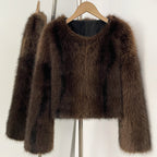 Front view of coffee brown collarless faux fur jacket with fluffy texture