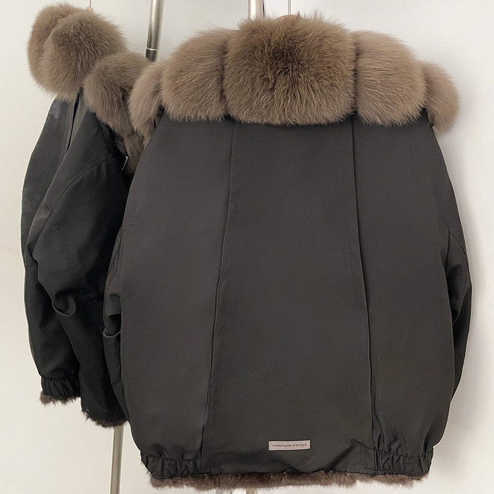 Back view of the luxury real fur parka showing the clean technical shell and fur hood