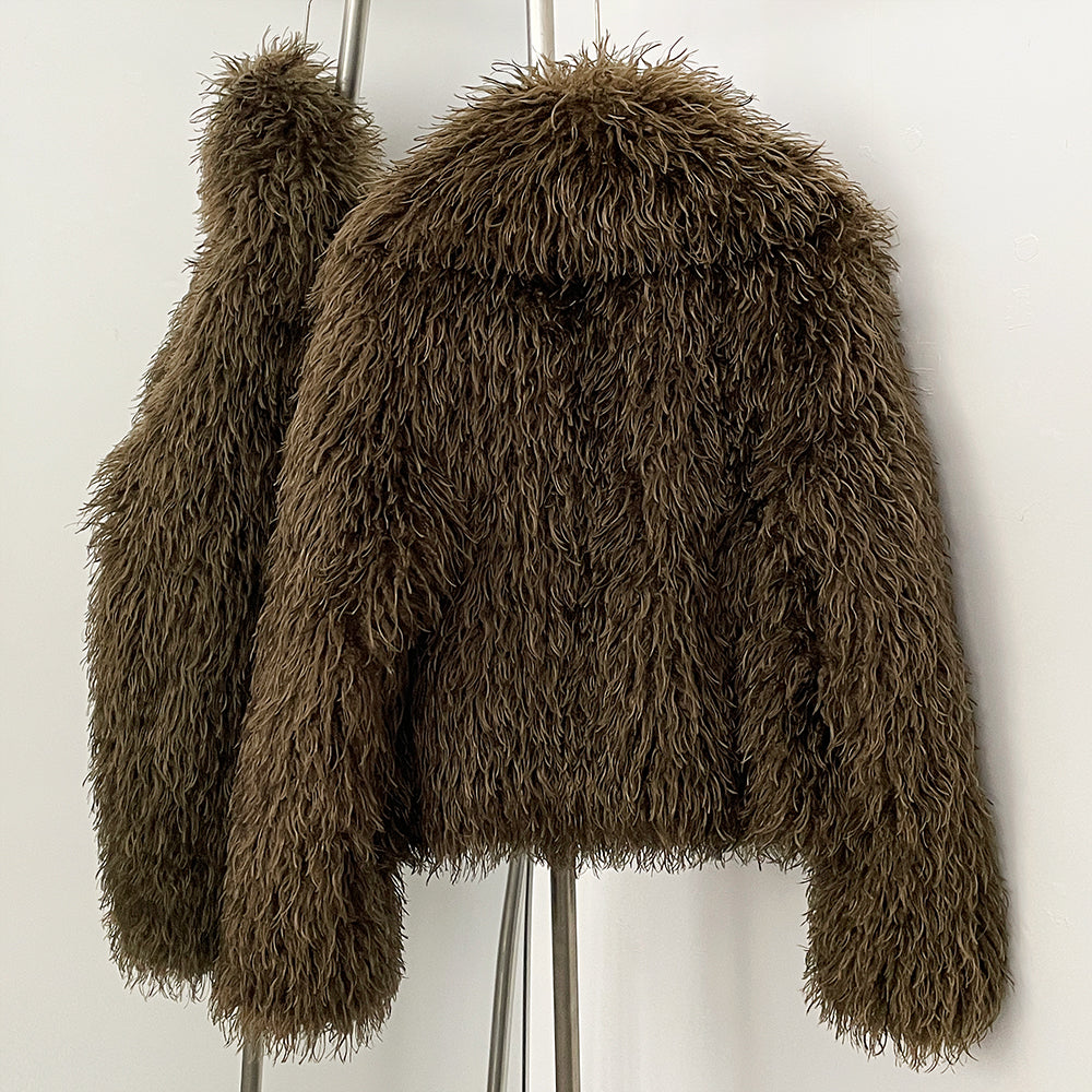 Rear full view of thick curly faux sheep fur cropped winter jacket
