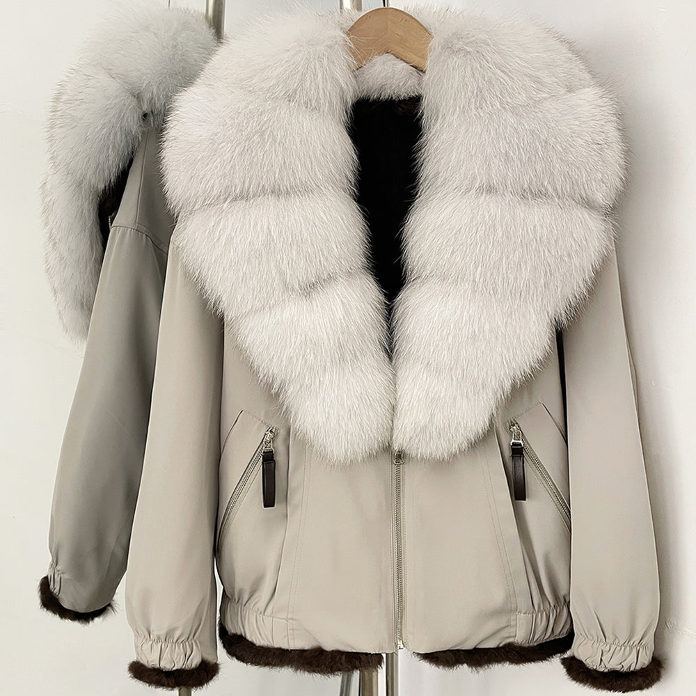 Ethereal beige grey parka with a pure white real fox fur collar and plush interior