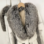 Close-up shot of thick layered silver frost genuine fox fur wide lapel on rabbit fur coat