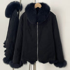 Navy blue reversible winter parka side showing windproof shell with real fox fur
