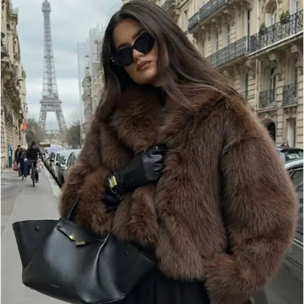 Woman in Paris wearing a luxury coffee brown faux fur jacket with oversized lapel