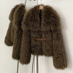 Side front view of neutral brown fluffy curly vegan fur coat