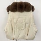 Detailed back view of luxury down jacket showing the embossed S logo design