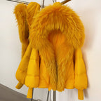 Bold electric yellow winter puffer jacket featuring a huge real fur shawl collar