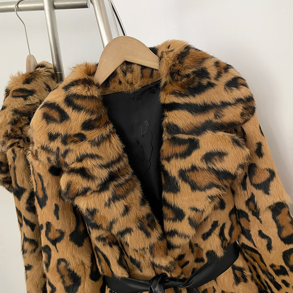 Close-up of oversized fluffy notched lapel on leopard real rabbit fur long coat