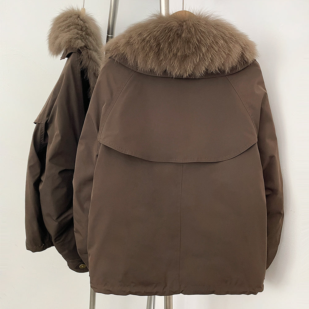 Back view of relaxed short parka with oversized fox fur collar