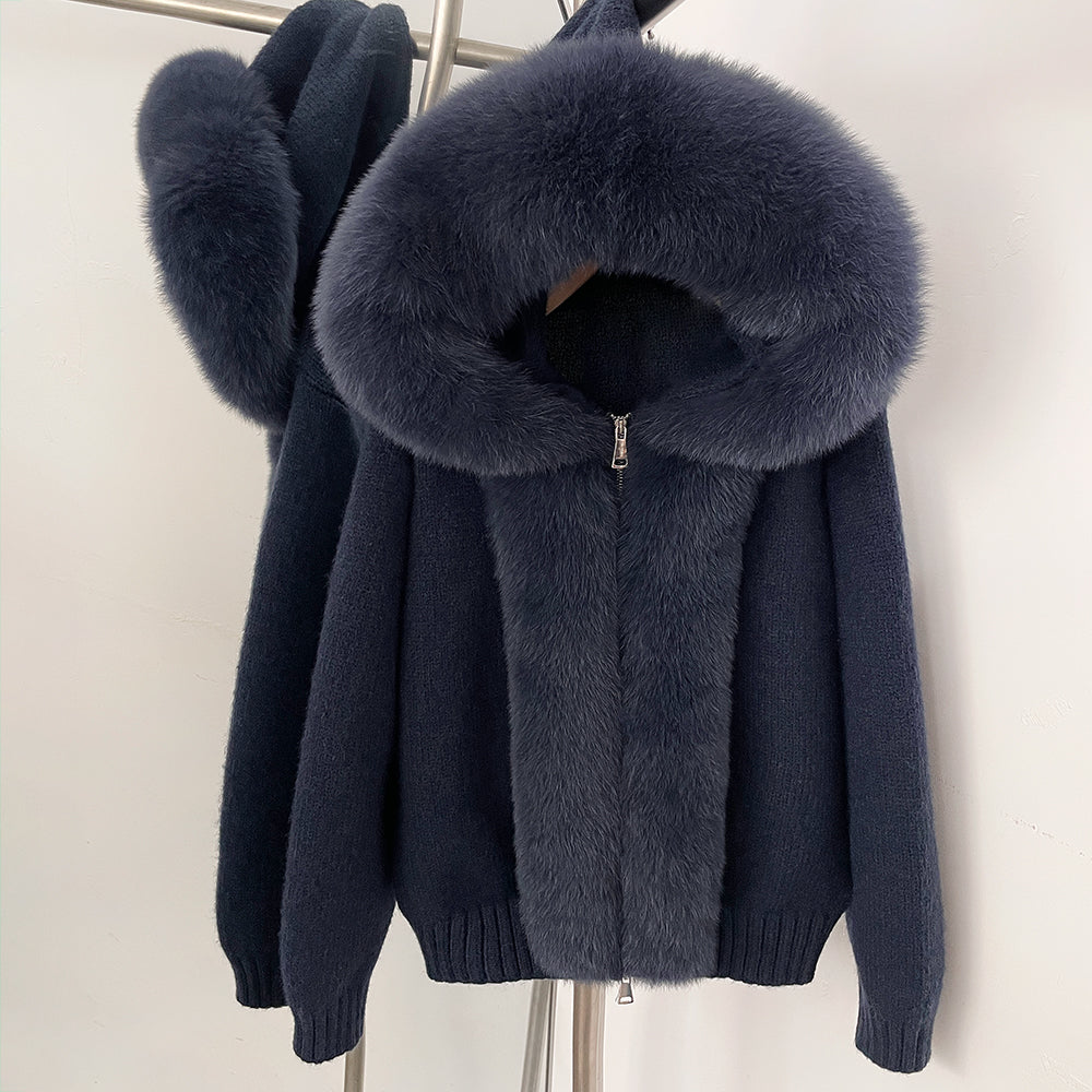Elegant navy blue knitted jacket with matching blue-toned real fox fur hood and trim