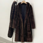 Side front full view of maxi length brown faux mink fur coat