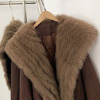 Close-up of thick fluffy genuine fox fur wide lapel on down jacket