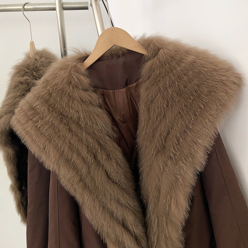 Close-up of thick fluffy genuine fox fur wide lapel on down jacket