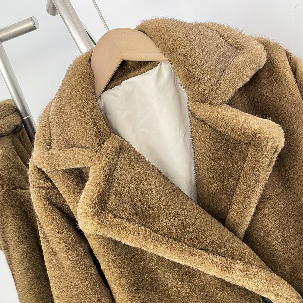  Close-up of wide tailored notched lapel on luxury vegan faux mink coat