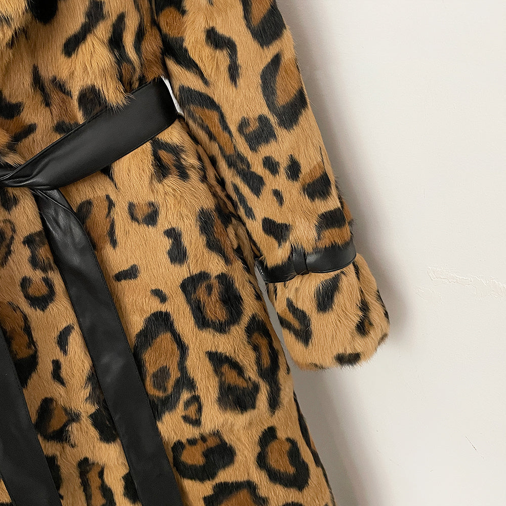 Detail shot of metal buckle adjustable cuffs on genuine rabbit fur trench