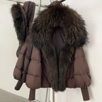 Rich espresso brown cropped down jacket with an oversized dark raccoon fur collar